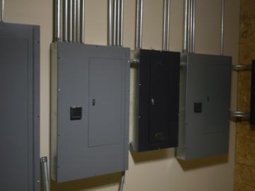 A few of the many panel boards in this building.